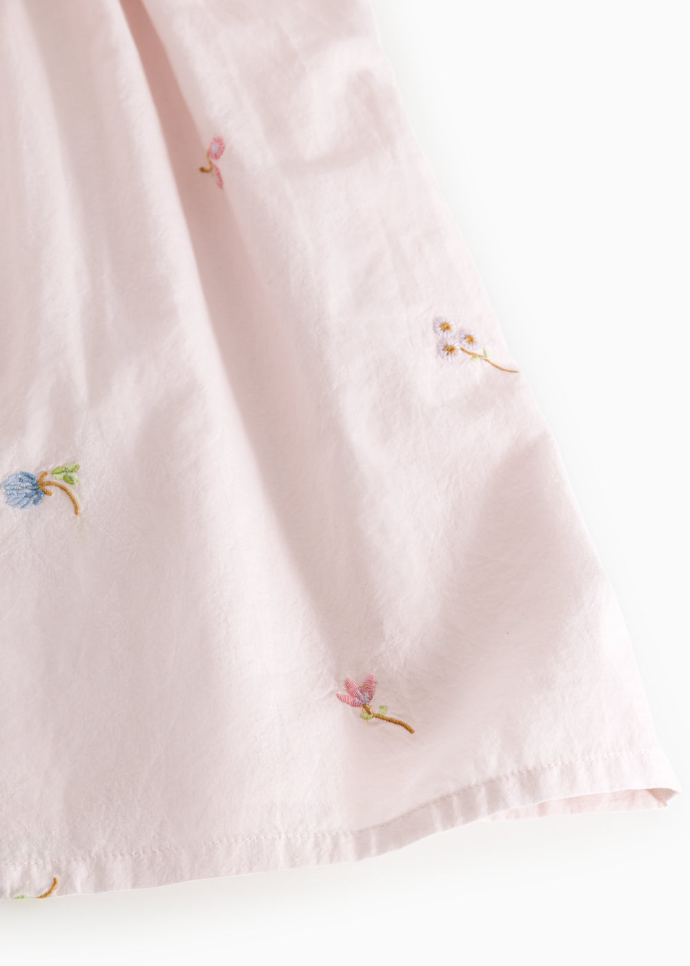 Red dress with small embroidery and puffed sleeves for children.