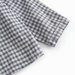 Fitted turtleneck baby shirt with a front closure