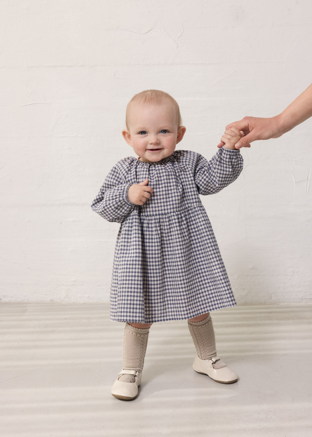 Baby wearing a long-sleeved tunic dress