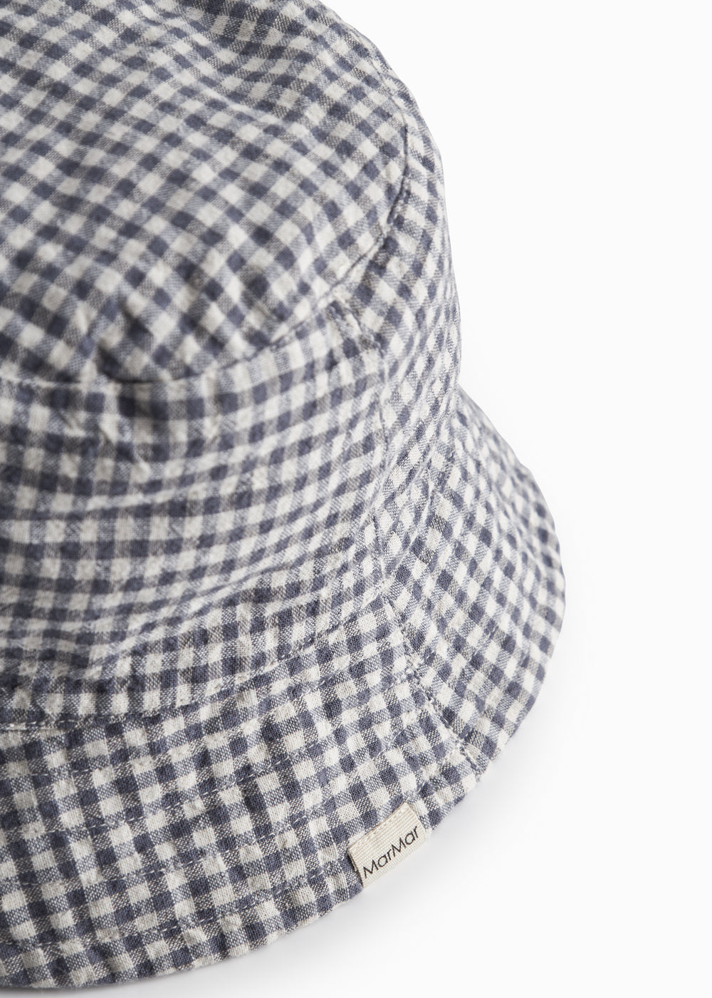 Internet-safe and white bobble hat for children.