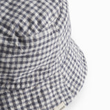 Internet-safe and white bobble hat for children.