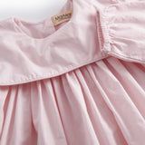 Lyserød babykjole med krave og lange ærmer