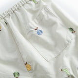 Lyse babyshorts with embroidered fruits and elastic waist.