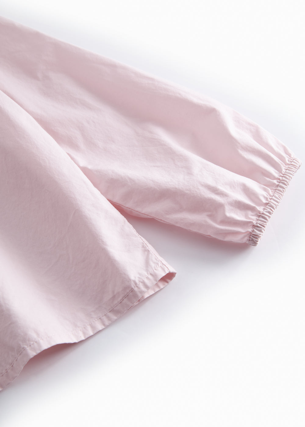 Red children's blouse with collar and long sleeves