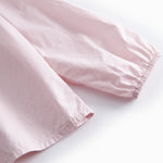 Red children's blouse with collar and long sleeves