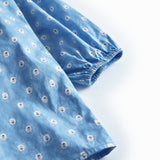 Blue children's dress with long sleeves, flounces, and small flowers.