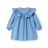 Blue children's dress with long sleeves, flounces, and small flowers.