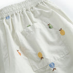 Lys children's shorts with embroidered fruits and elastic waist.