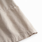 Gray sleeveless dress for children with wide stripes, buttons, and pockets.