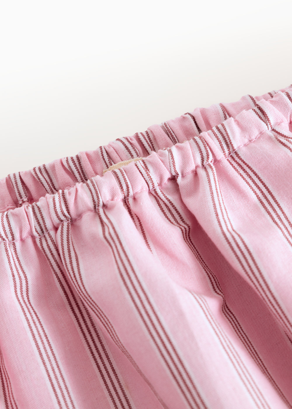 Lyserøde stribede baby bloomers med elastik i livet