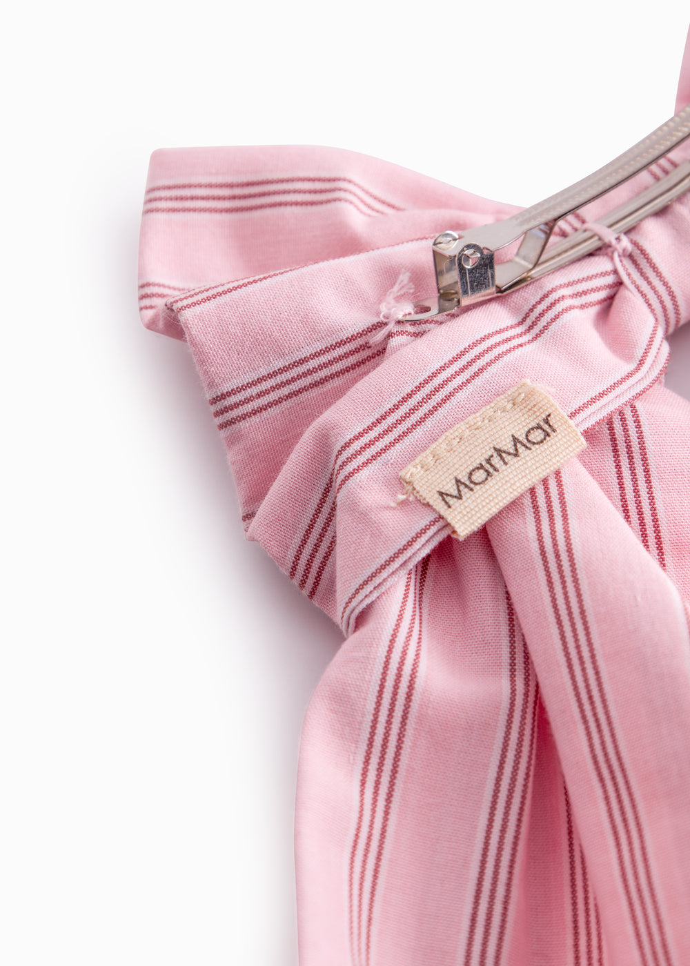 Lyserød sløjfespænde til håret med fine striber