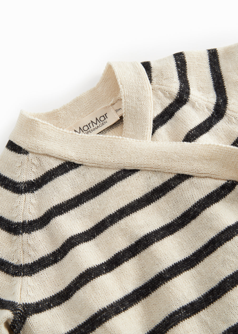 Baby striped cardigan with stripes and a toggle closure