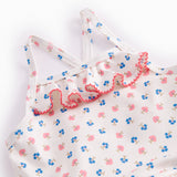 Children's swimwear with flowers and lace.