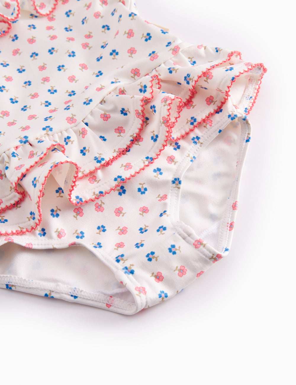 Children's swimwear with flowers and lace.