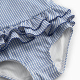 Children's swimwear with blue stripes and ruffles.
