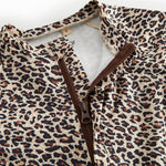 Bathing suit for children with brown leopard print and zipper.