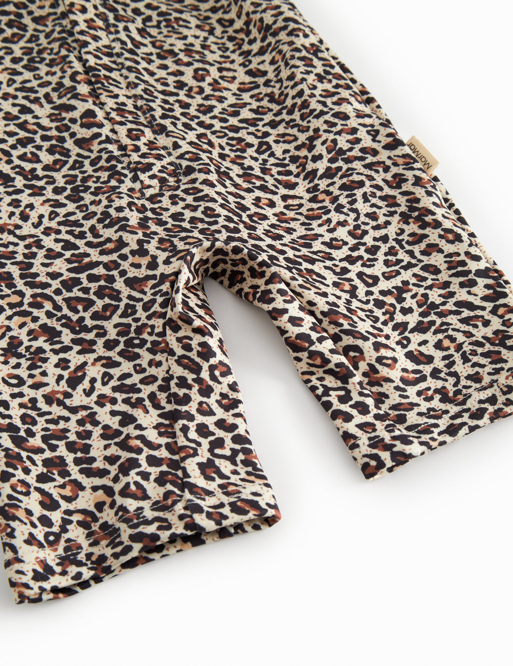 Bathing suit for children with brown leopard print and zipper.