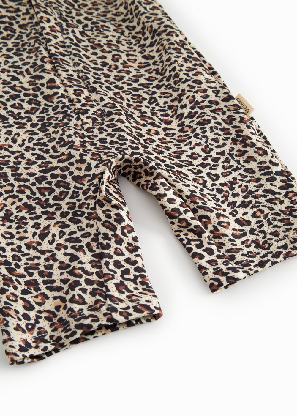 Bathing suit for children with brown leopard print and zipper.