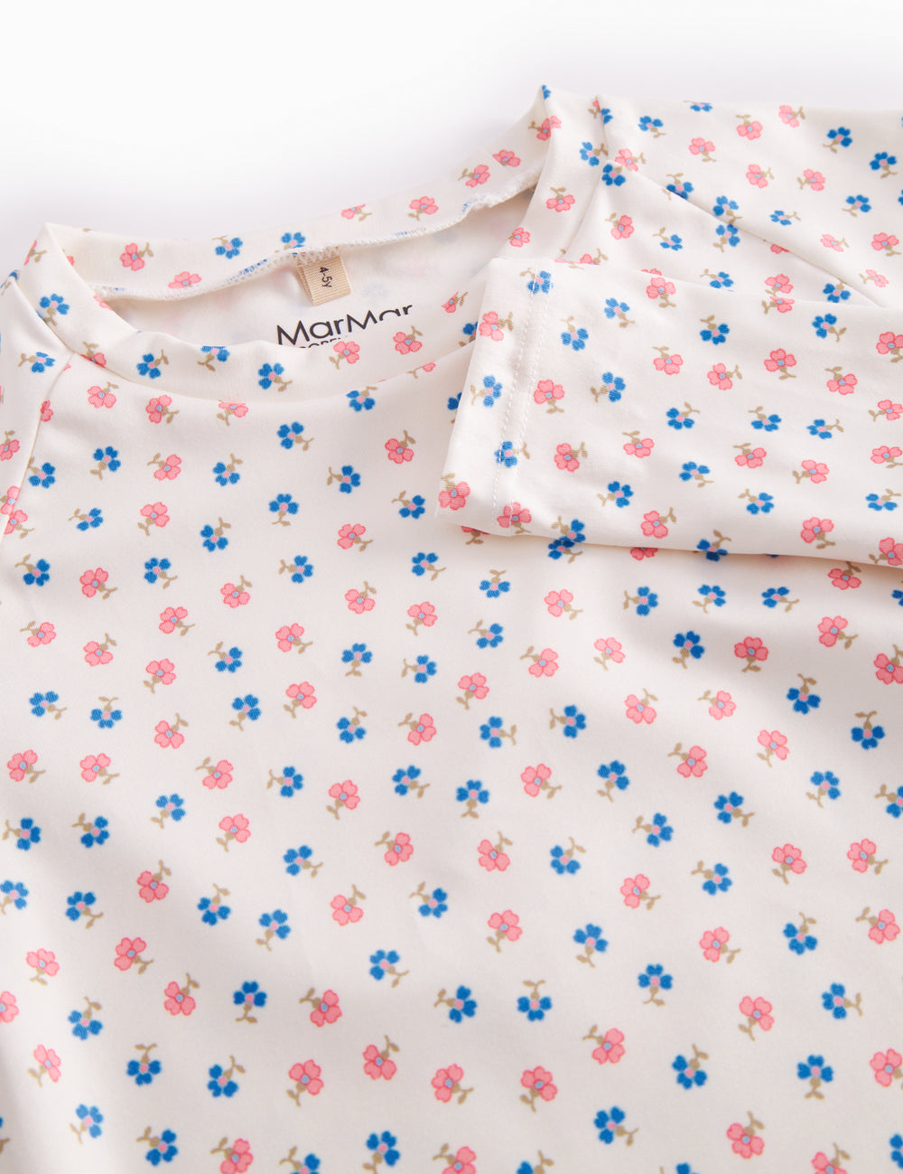 Langärmet badetrøje til børn med blomster print

Warm children's swimsuit with a floral print