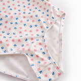 Children's swimwear with a floral pattern and flounces.