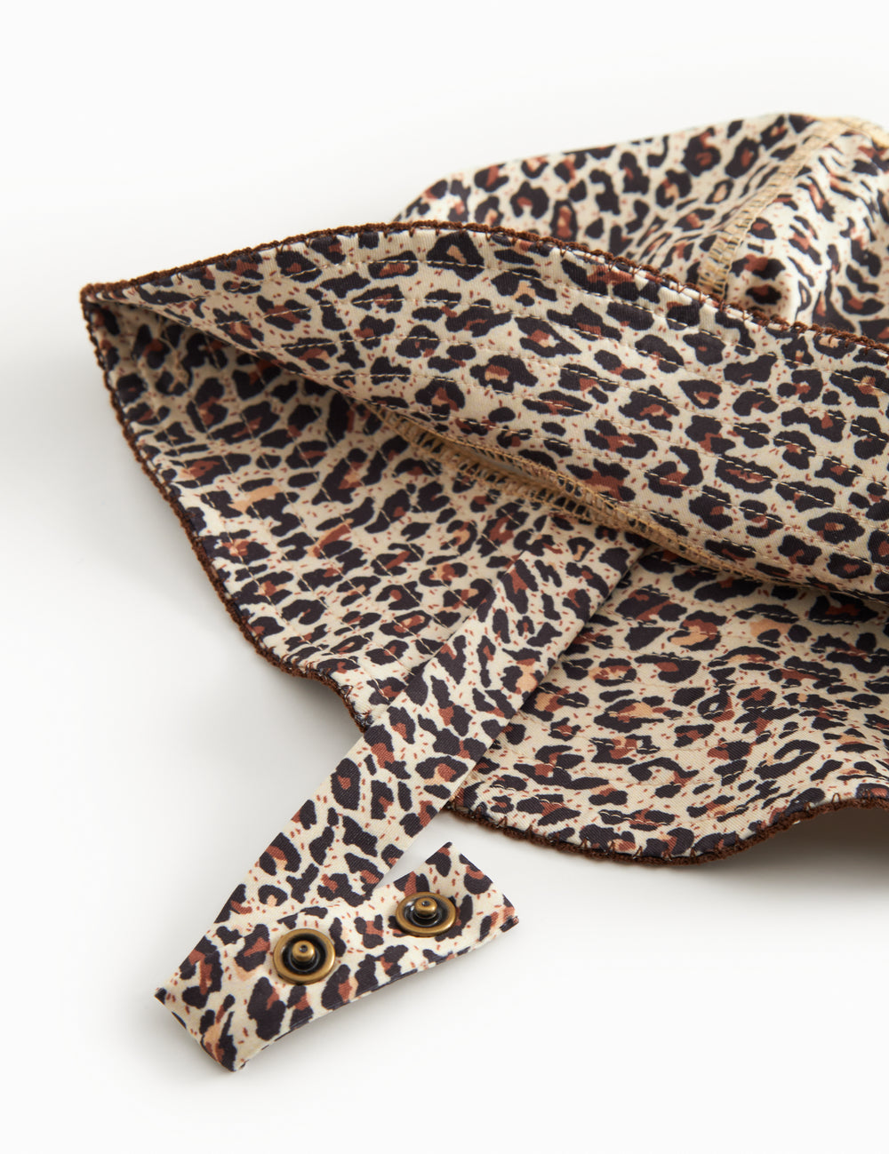 Child's swim cap with brown leopard pattern