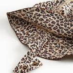 Child's swim cap with brown leopard pattern