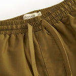 Brown swim trunks with drawstrings for children