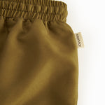 Brown swim trunks with drawstrings for children