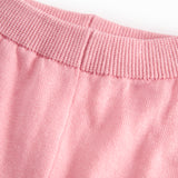 Lyserøde strikbukser til baby
