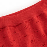 Røde baby strikbukser med fødder og fint hulmønster