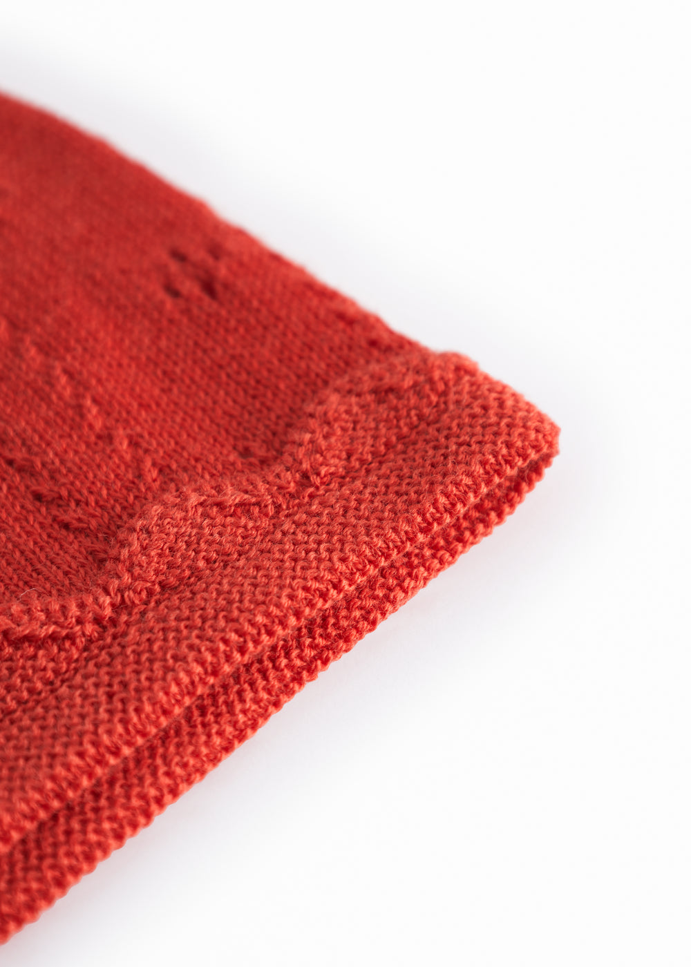 Red polka dot baby helmet with ties