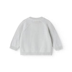 Lysegrøn strik cardigan til baby, med fint hulmønster og knaplukning