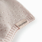 Red baby helmet with red with and a