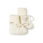 Roughly cut baby food in white with a rib and and band.