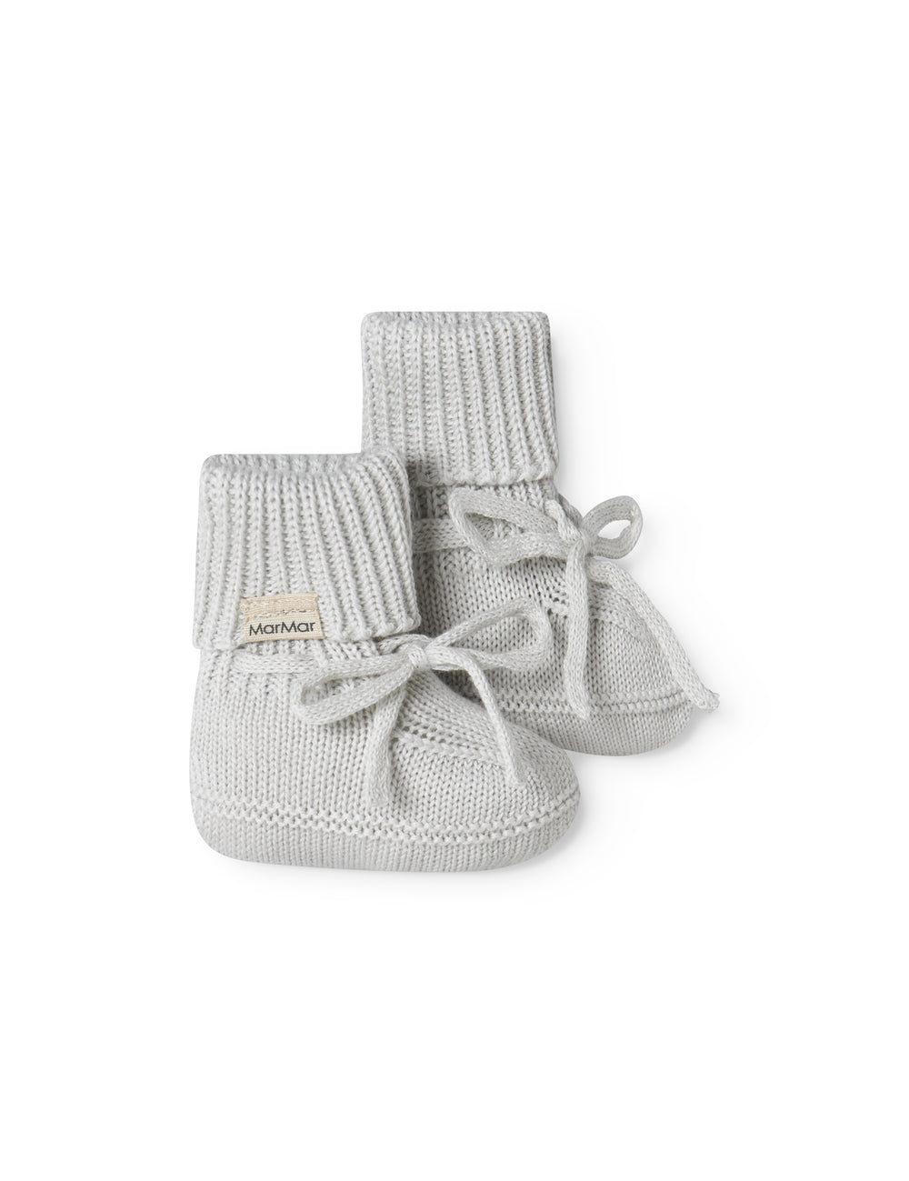 Green striped baby food with a ribbed edge and tie.