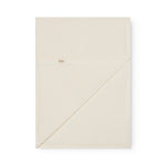 White baby blanket with a hole pattern