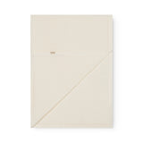 White baby blanket with a hole pattern