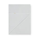 Green baby blanket with a hole pattern