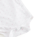 White baby bodysuit with small flowers