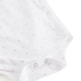 White baby bodysuit with small flowers