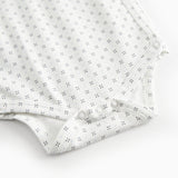 White baby bodysuit with fine pattern