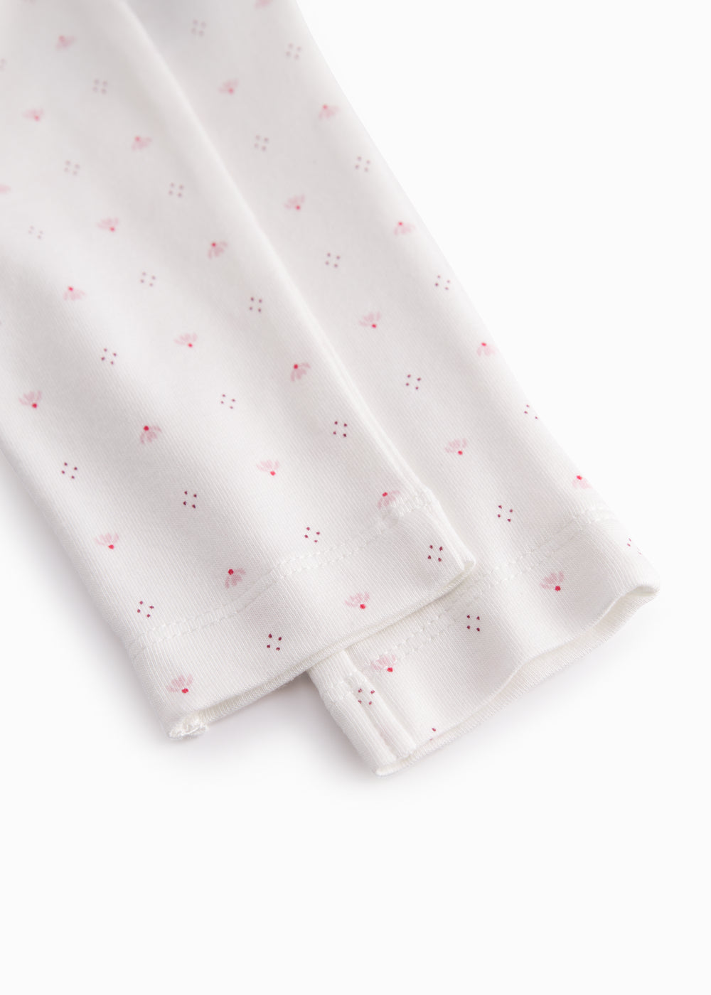 White baby trousers with small flowers