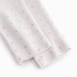 White baby trousers with small flowers