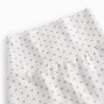 White baby trousers with fine pattern