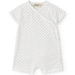 White baby sleepsuit without legs with fine pattern