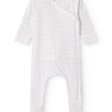 White baby all-in-one with feet in fine floral pattern