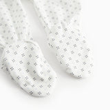 White baby all-in-one with feet in fine pattern