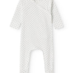 White baby all-in-one with feet in fine pattern