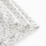 White baby blanket with fine pattern