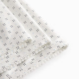 White baby blanket with fine pattern